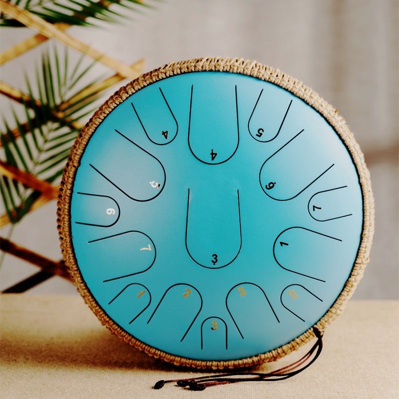 Tambour à langue à percussion