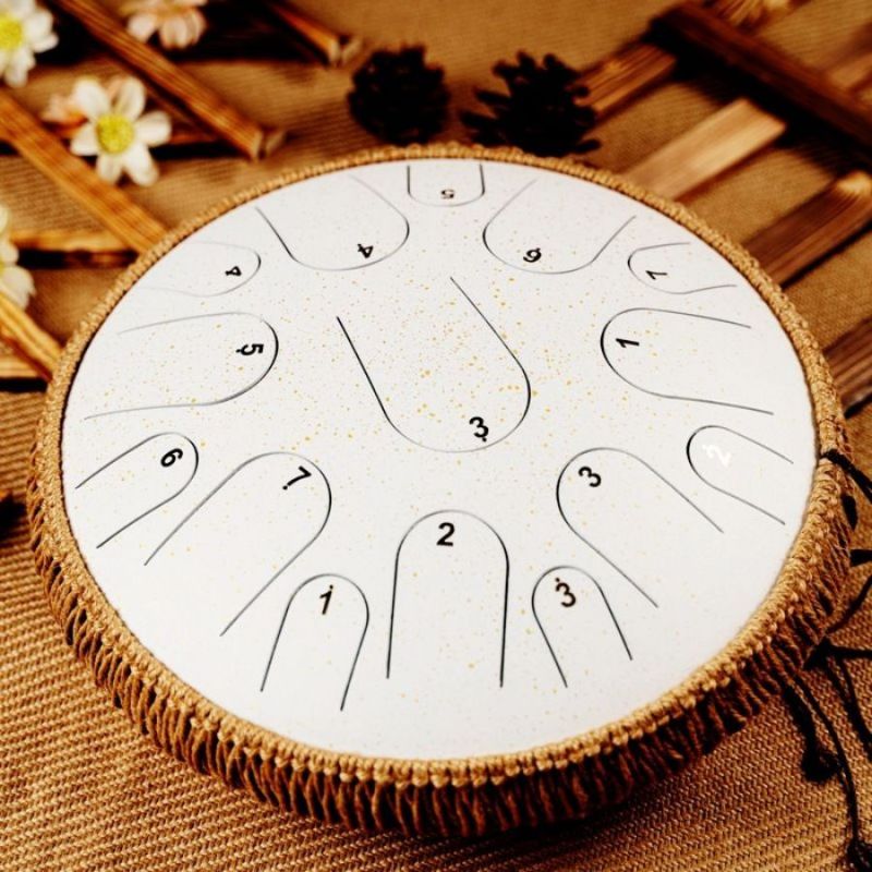 Tambour à langue à percussion