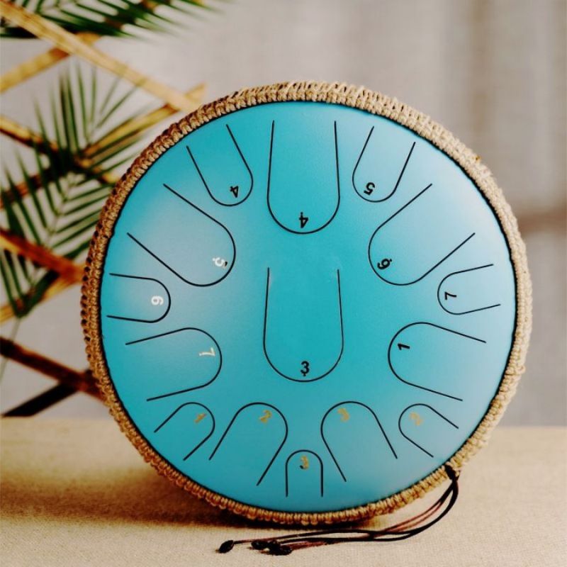 Tambour à langue à percussion